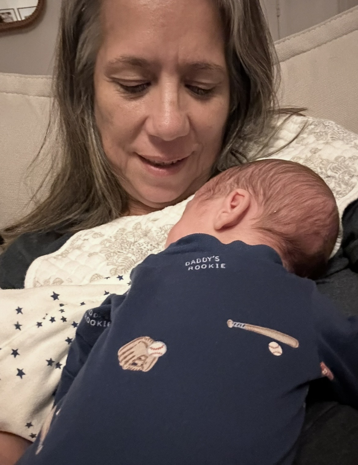 Ana Bachmann gently caring for a newborn